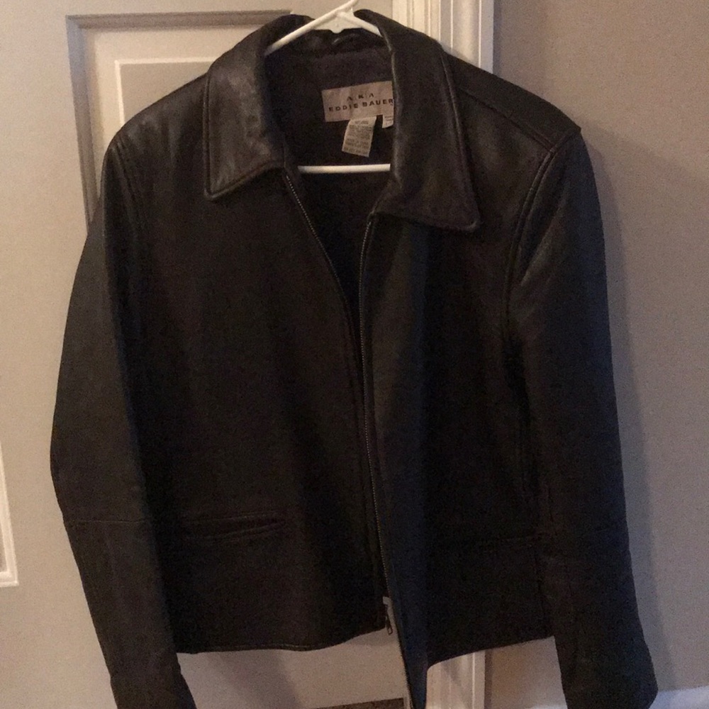 Women’s dark brown large genuine leather jacket.